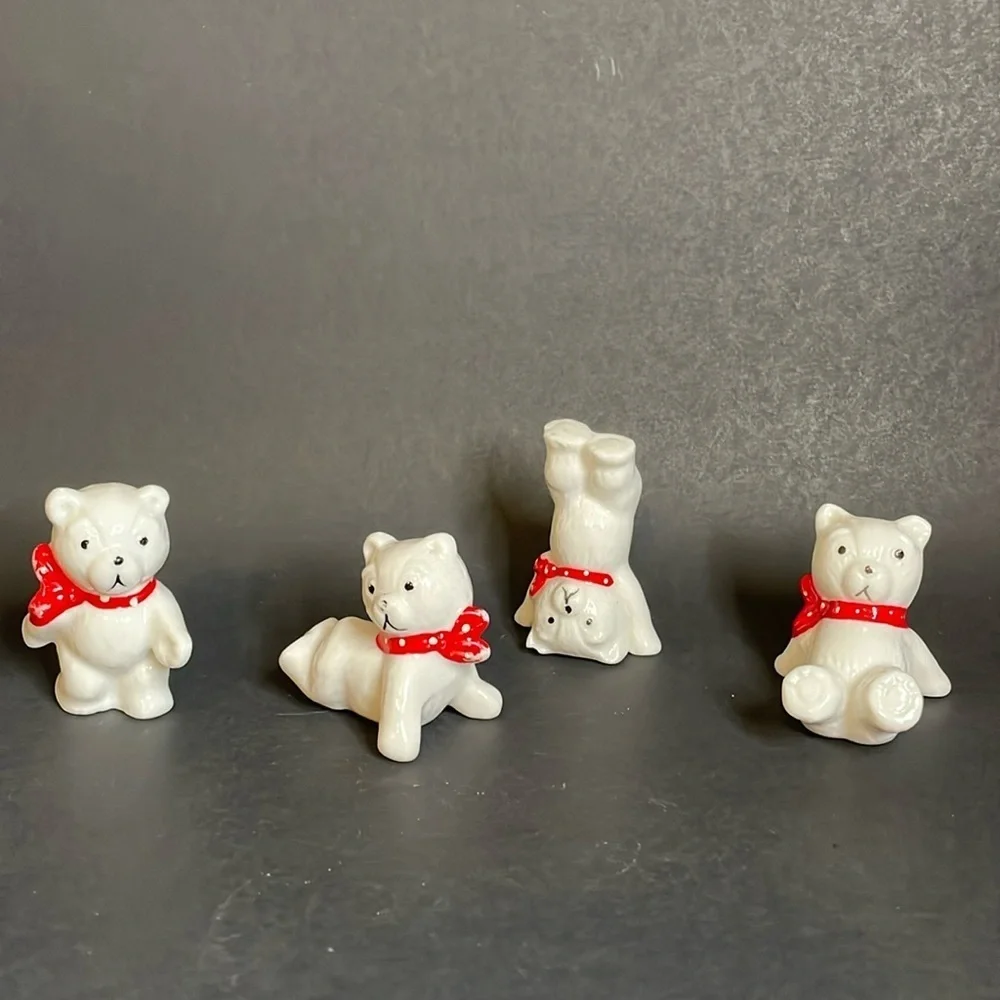 Set‎ of (4) Porcelain/china Posing Polar Bears with Red Bows